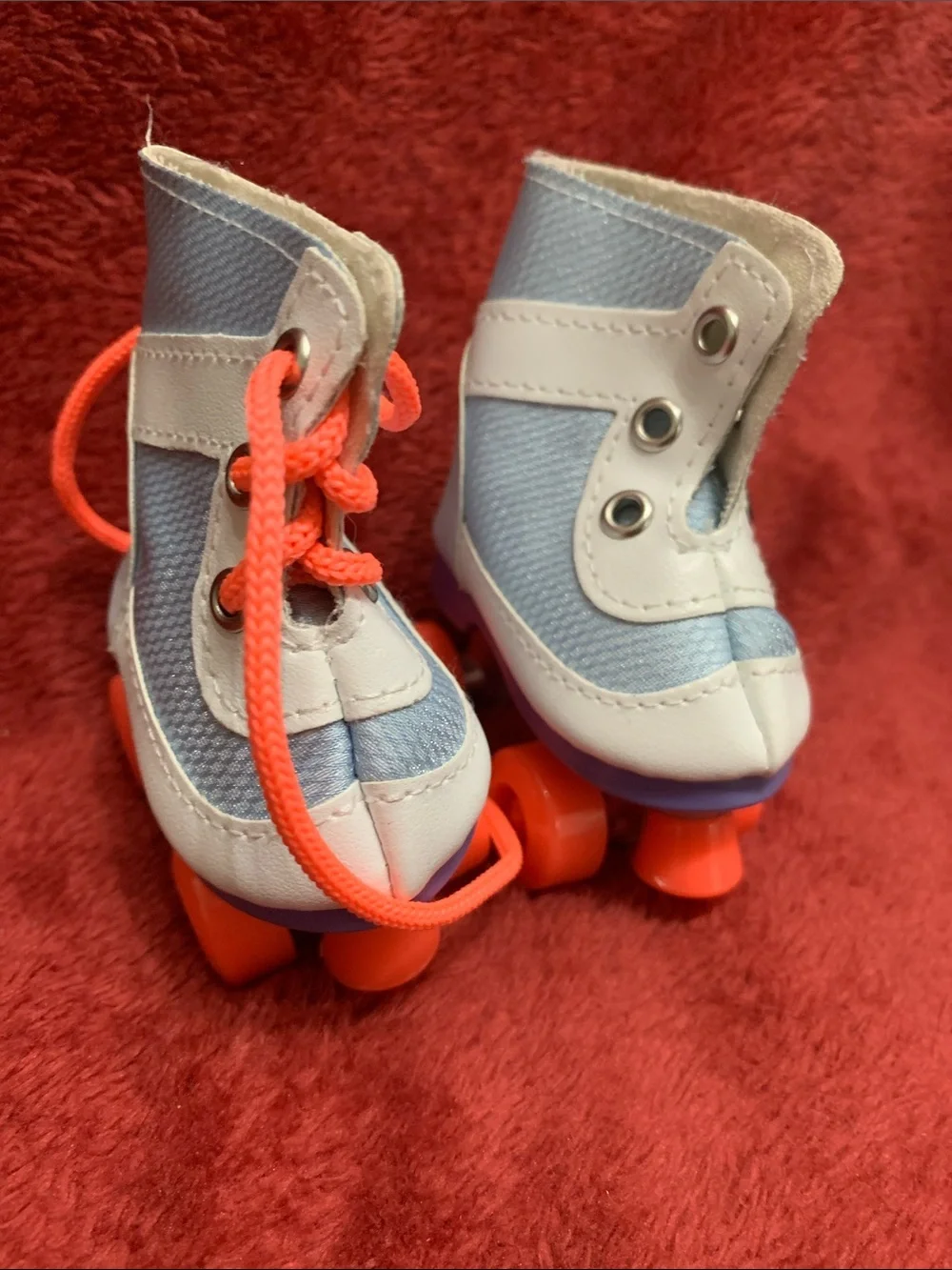 Kids Light Blue High-Top Roller Boots with Bright Orange Laces